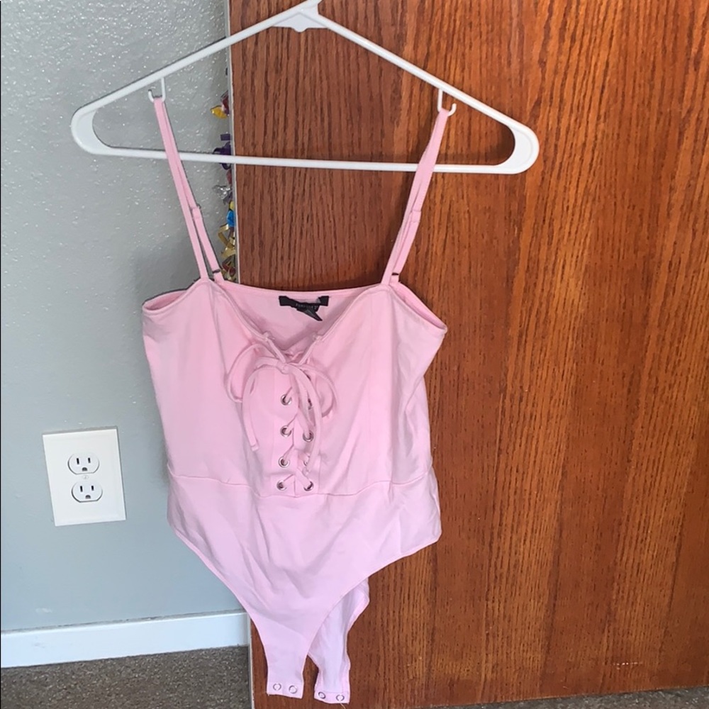 light pink body suit